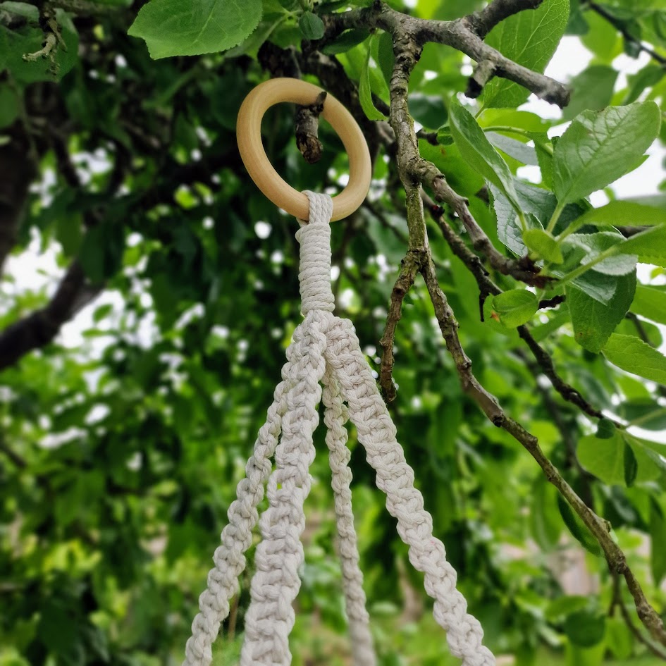 Triple-layered macramé plant hanger or vegetable holder made from natural cotton rope for boho home décor