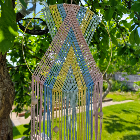 Handcrafted geometric macramé wall hanging in Pastel colours (Pink, blue, yellow and green with beads for boho décor
