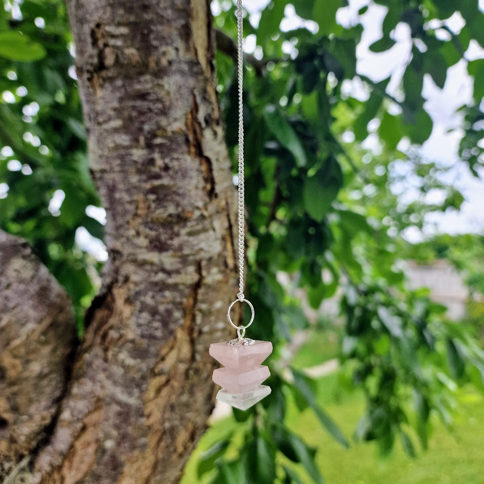 Pyramid Crystal Pendulum featuring Amethyst, Rose Quartz, and Clear Quartz with a silver chain for chakra healing, dowsing, and spiritual practices.