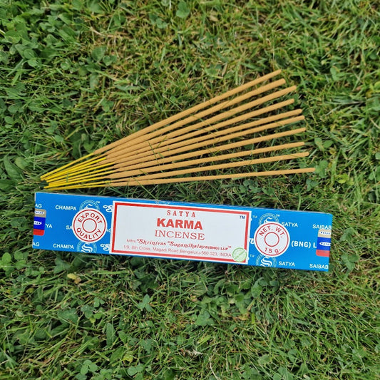 Satya Karma Incense in original blue box packaging, 15g of aromatic hand-rolled incense sticks