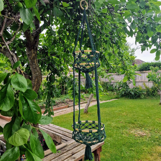 Triple-layered macramé plant hanger or vegetable holder made from natural cotton rope for boho home décor