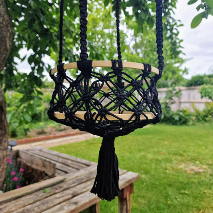 Triple-layered macramé plant hanger or vegetable holder made from natural cotton rope for boho home décor